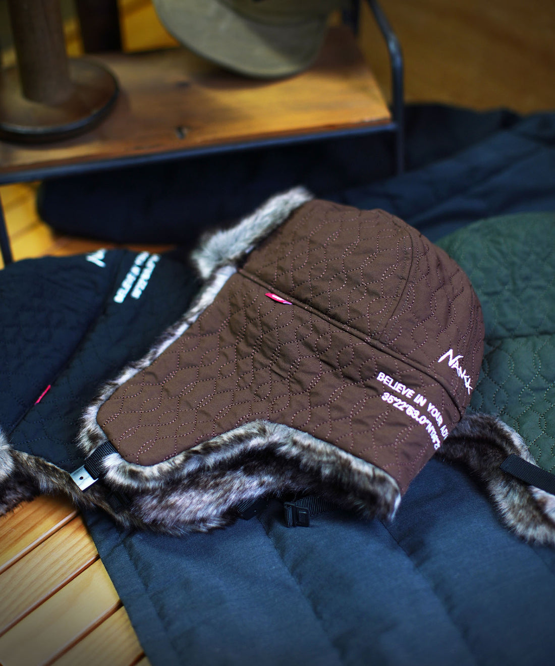 NANGA X CLEF QUILT PILOT CAP / 聯名羽絨格紋保暖飛行帽